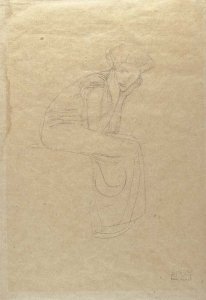 Seated woman holding her head in her hands